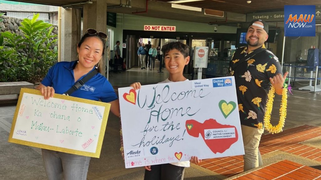 Maui United Way’s, Jeeyun Lee, Kaimakana Lum and CHNA’s, Dustin Kaleiopu, eagerly awaiting the arrival of the Mailau-Laborte ‘ohana Thursday afternoon.