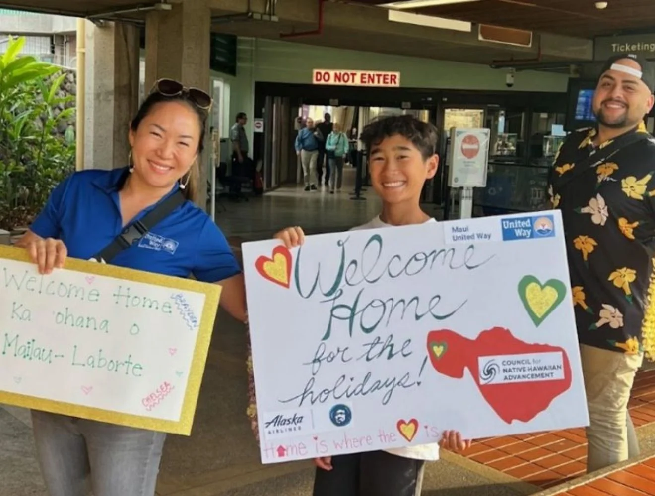 MUW Blog Post Images 2026 Welcome home signs help by two people