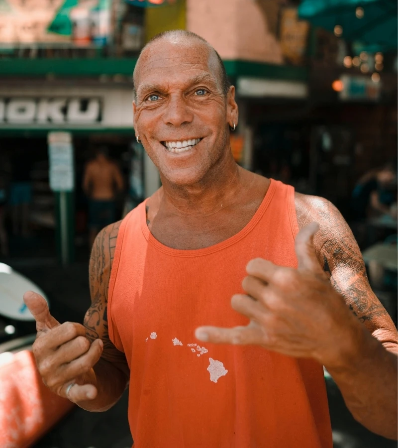 Maui Guy Local Maui man wearing orange tank top